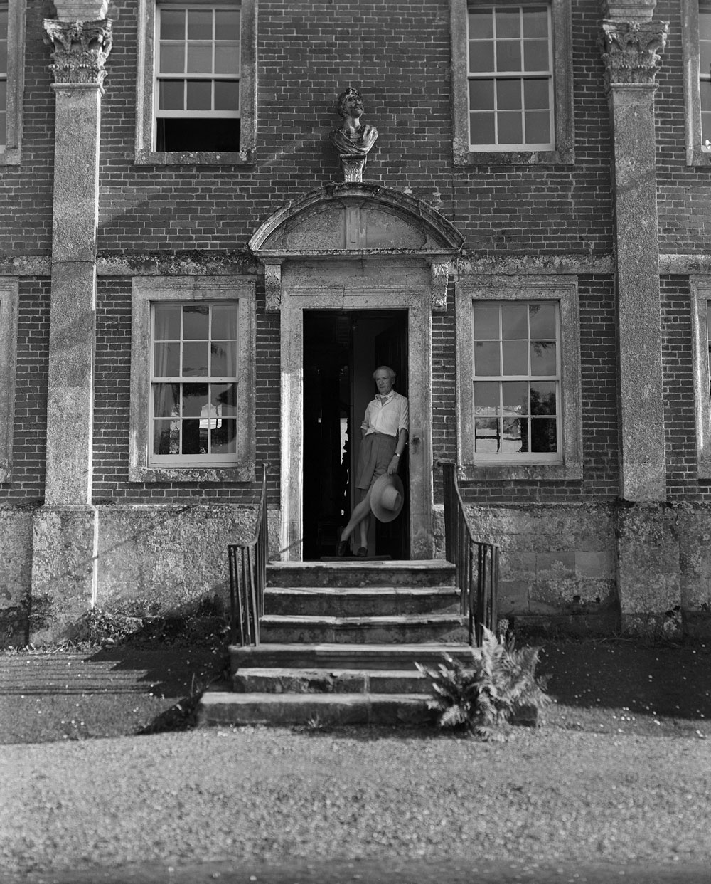 Cecil Beaton. 'Cecil Beaton on the front steps of Reddish House, Broad Chalke, June 1947, Reddish' 1947