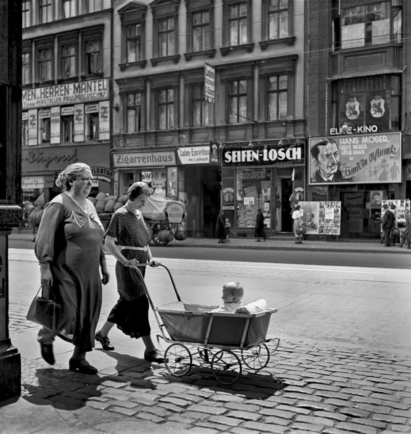 Roman Vishniac (1897-1990) 'Women walking with a baby carriage' 1935