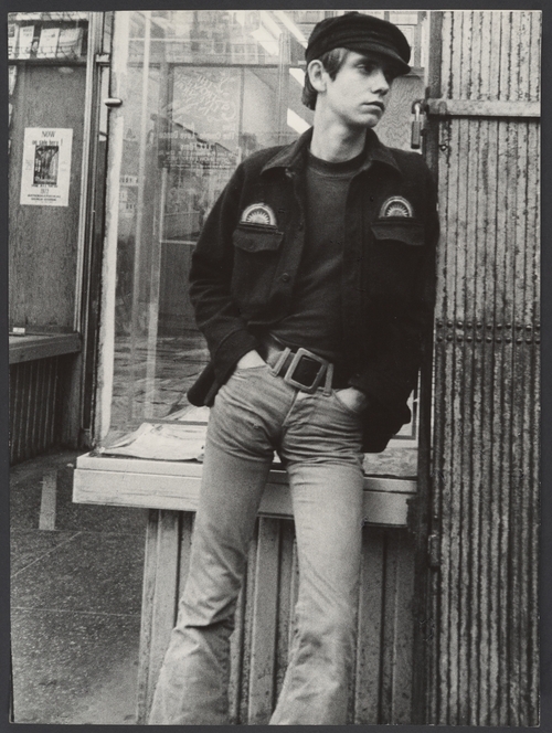 Leon Levinstein. 'Street Scene - Young Man Leaning against Shopfront Window, New York City?' 1972