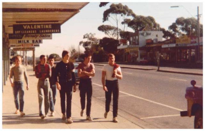 Larry Jenkins. 'Chad, Jono and Mig, Twig, Beatie and Whitey walking down the street at Blackburn South shops' 1975