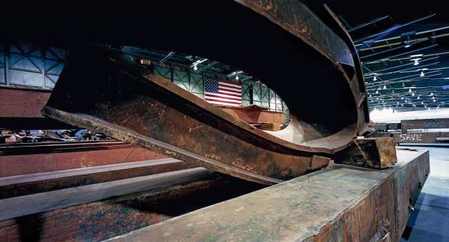 Francesc Torres. 'Twisted steel beams from ground zero dominate the space in JFK International Airport's Hangar 17, where 9/11 artifacts were housed for study and safekeeping' 2009