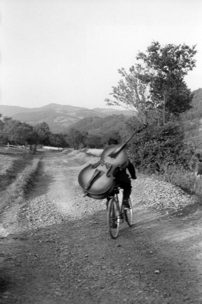 Henri Cartier-Bresson (French, 1908-2004) 'Serbia. Bass player on the road Belgrade-Kraljevo, to play at a village festival near Rudnick' Yugoslavia 1965