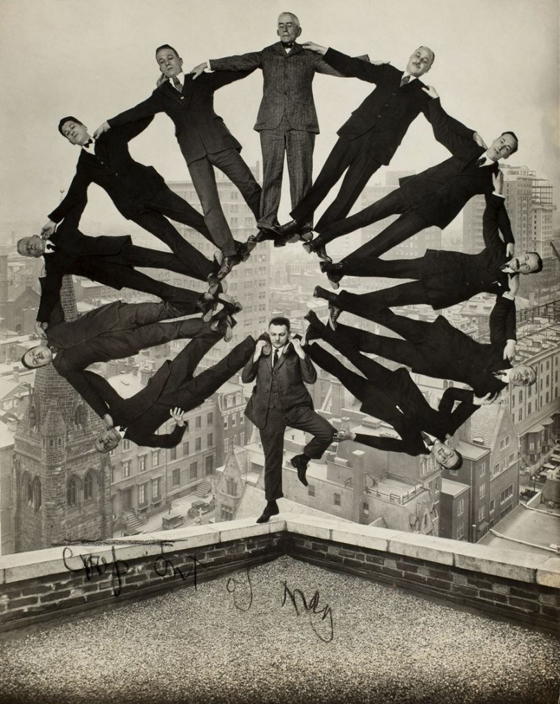 Unidentified American artist. 'Man on Rooftop with Eleven Men in Formation on His Shoulders' c. 1930