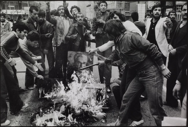 Abbas. 'France Rioters burn a portrait of the Shah as a sign of protest against his regime. Tehran, December 1978' 1978-9