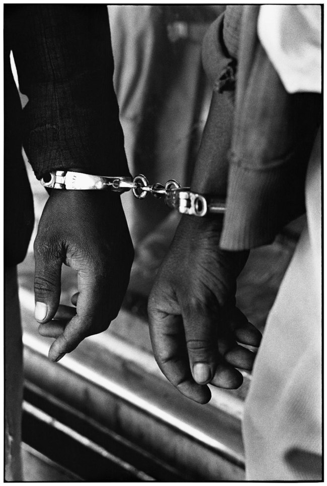 Ernest Cole (South African, 1940-1990) 'Handcuffed blacks were arrested for being in white area illegally' 1960-1966