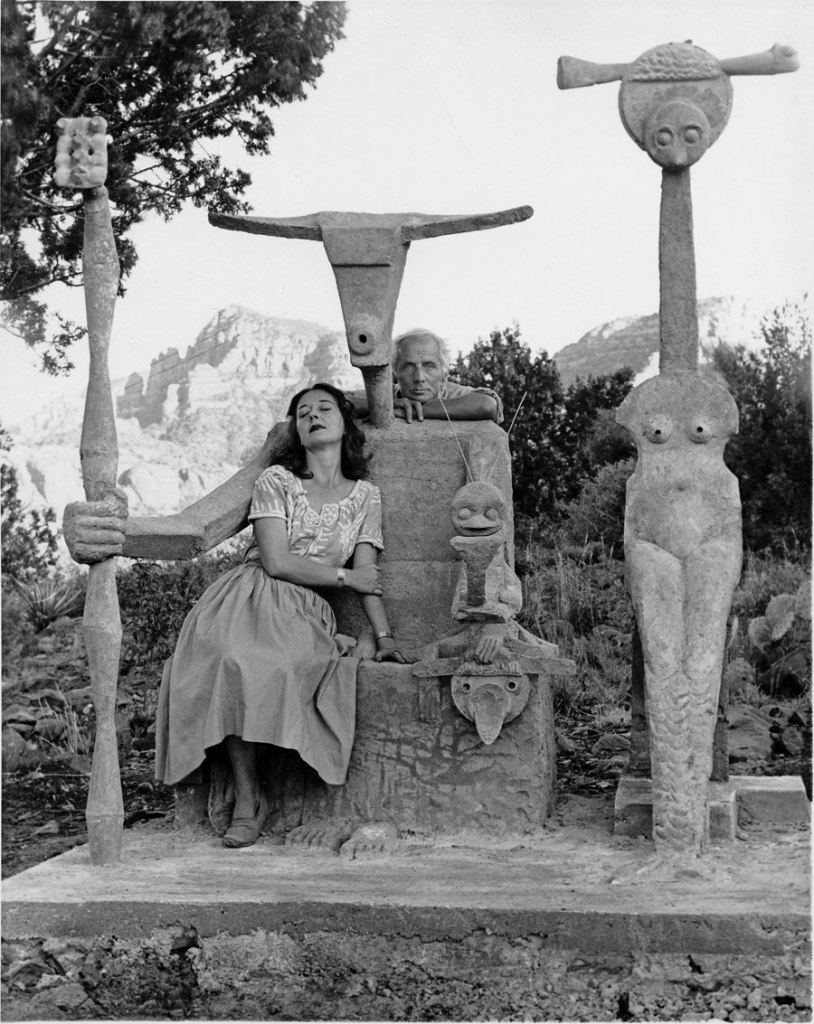 'Dorothea Tanning and Max Ernst with the cement sculpture Capricorne (Capricorn), Sedona, Arizona' 1948