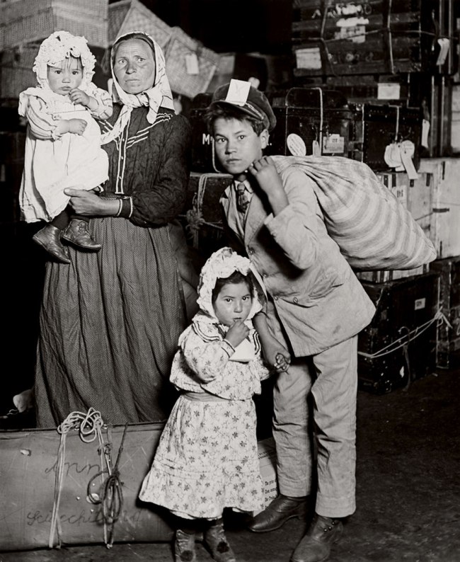 Lewis W. Hine (American, 1874-1940) 'Italian Family Looking for Lost Baggage, Ellis Island' 1905