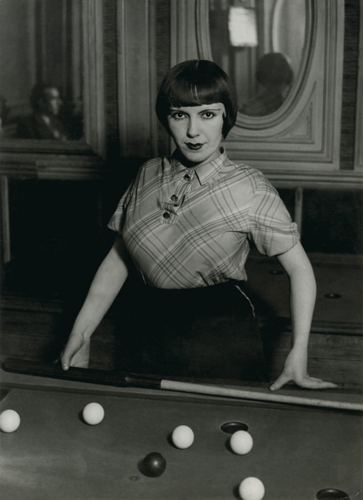 Brassaï (French, 1899-1984) 'Fille de Montmartre playing Russian billiards, Blvd Rochechouart' 1932-33