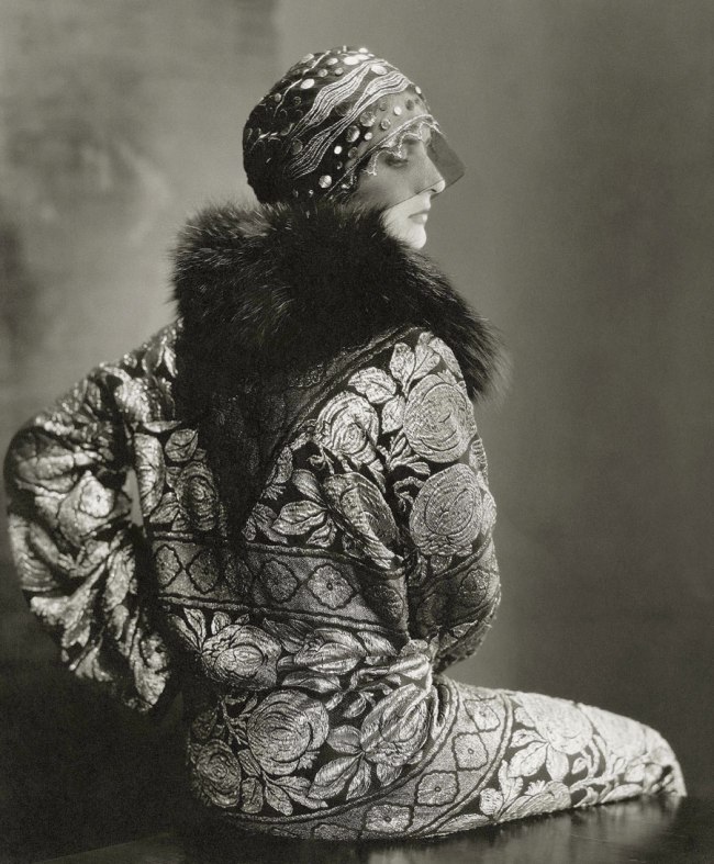 Edward Steichen (American 1879-1973, emigrated to United States 1881, worked in France 1906-23) 'Model wearing a black tulle headdress by Suzanne Talbot and a brocade coat with black fox collar' 1925