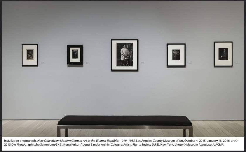 Installation view of the exhibition 'New Objectivity: Modern German Art in the Weimar Republic, 1919-1933' at LACMA showing photographs by August Sander