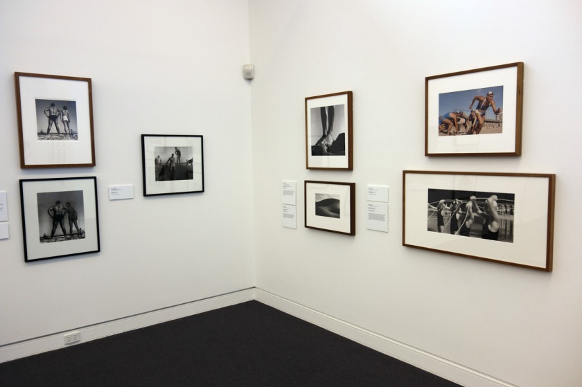 Installation view of the exhibition 'On the beach' at the Mornington Peninsula Regional Art Gallery showing, at top left, Max Dupain's 'Form at Bondi' (1939); to the right of that Dupain's 'At Newport' (1952); to the right upper is George Caddy's 'Chest strength and breathing exercise, 20 February 1937'; followed at far right by Rennie Ellis' 'St Kilda Lifesavers' (1968, top) and David Moore's 'Lifesavers at Manly' (1959, bottom)
