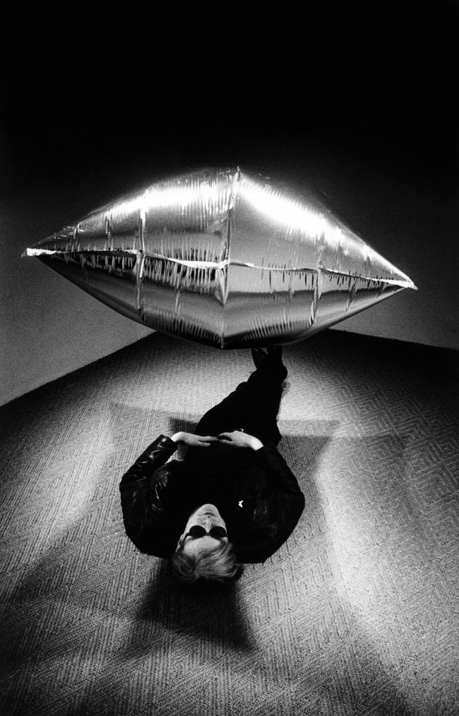 Steve Schapiro (American, 1934-2022) 'Andy Warhol Under the Silver Cloud Pillow, New York' 1965