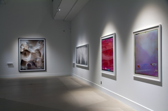 Installation view of the exhibition 'Emanations: The Art of the Cameraless Photograph' at the Govett-Brewster Art Gallery with at left, the work of Thomas Ruff, and at right, Justine Varga