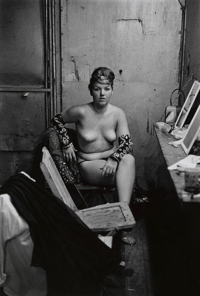 Diane Arbus (American, 1923-1971) 'Stripper with Bare Breasts Sitting in Her Dressing Room, Atlantic City, N.J. 1961' 1961