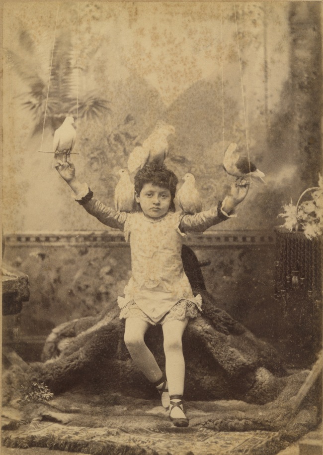 Elite Photo Co., (Eddie Hutchison) 'Girl in ballet shoes, with pigeons' 1884-1891