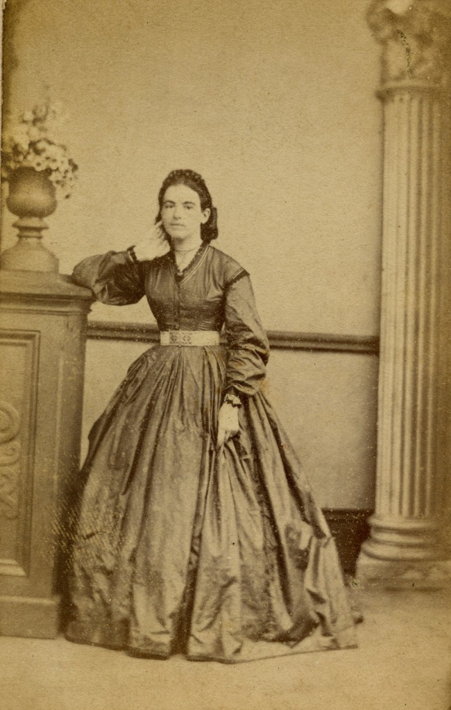 Daniel Marquis (Australian born Scotland, 1829-1879) 'The same woman in a crinoline dress posing with a chair' 1865-1870