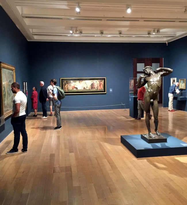 Installation view of Room 1 of the exhibition 'Queer British Art' at Tate Britain with Frederic Leighton's 'The Sluggard' (1885, bronze) in the middle of the room