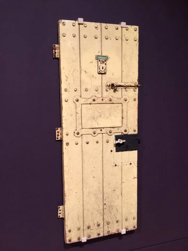 Installation view of Room 2 of the exhibition 'Queer British Art' at Tate Britain with Oscar Wilde's Prison Door c. 1883