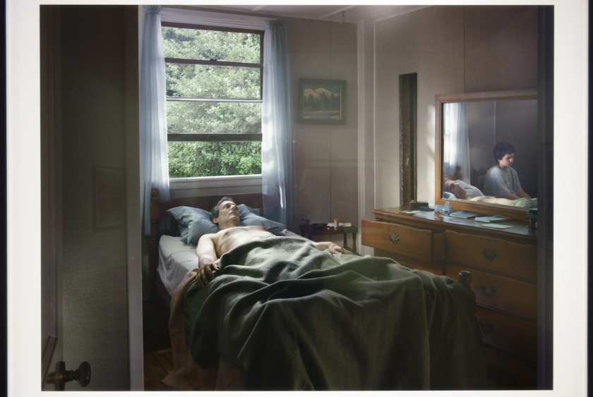 Installation view of Room 2 of 'Gregory Crewdson: Cathedral of the Pines' at The Photographers' Gallery showing 'Father and Son' 2013