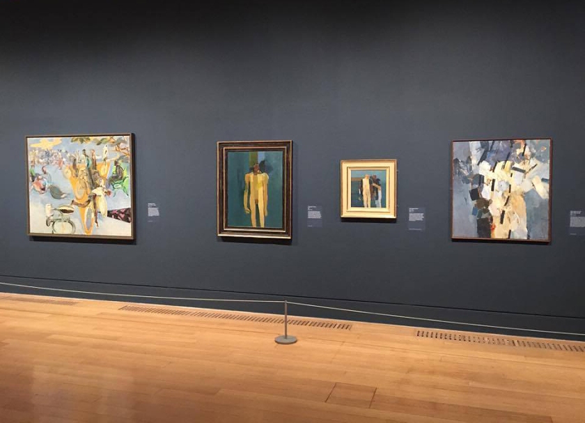 Installation view of Room 6 of the exhibition 'Queer British Art' at Tate Britain with Robert Medley's 'Summer Eclogue No. 1: Cyclists' 1950 at left, Keith Vaughan's 'Kouros' 1960 second left, Keith Vaughan's 'Three Figures' 1960-1961 second right, and his 'Bather: August 4th 1961' 1961 at right