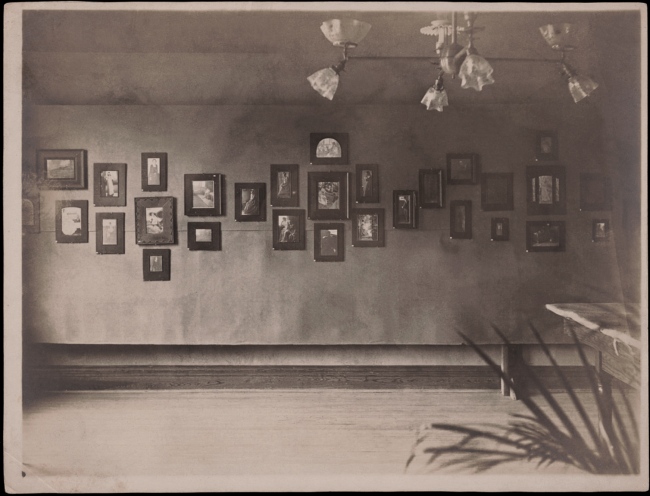 Display of Clarence H. White photographs in Newark Camera Club exhibition, Young Men's Christian Association building, Newark, Ohio, 1899