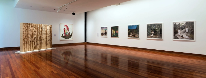 Installation view of the exhibition 'All the better to see you with: Fairy tales transformed' at The Ian Potter Museum of Art, Melbourne showing Kylie Stillman's 'Scape' (2017) at left, Kiki Smith's 'Born' (2002) middle and Polixeni Papapetrou's work at right