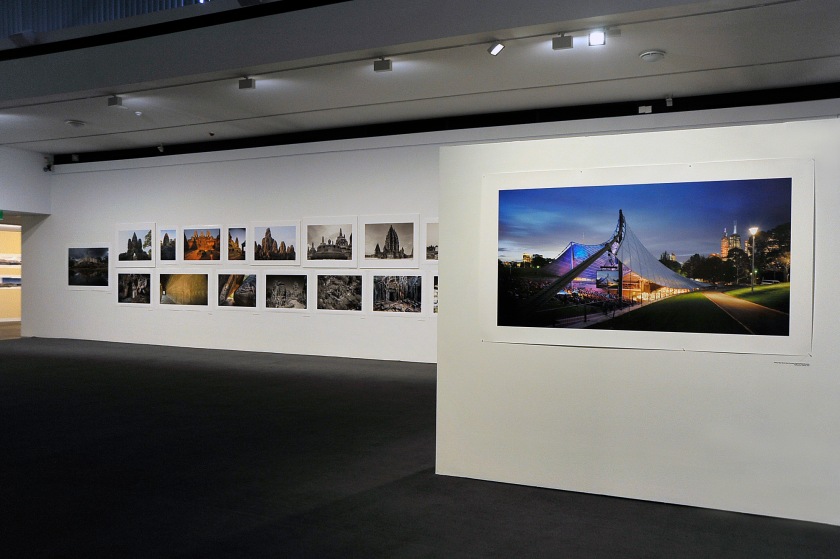 Installation view of the exhibition 'John Gollings: The history of the built world' at the Monash Gallery of Art showing at right, 'Sidney Myer Music Bowl refurbishment (Yuncken Freeman/Greg Burgess), Melbourne, Victoria' 2001