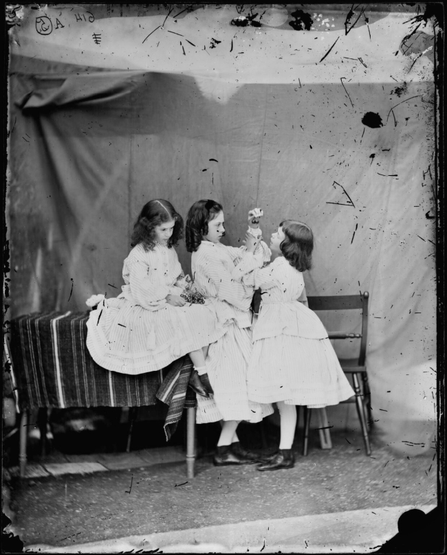 Lewis Carroll (1832-98) ''Open your mouth, and shut your eyes' (Edith Mary Liddell; Ina Liddell; Alice Liddell)' July 1860