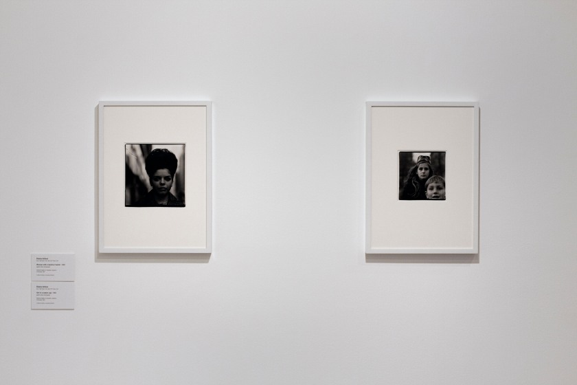 Installation view of the exhibition 'Diane Arbus: American Portraits' at the Heide Museum of Modern Art, Melbourne showing from left to right, Diane Arbus' 'Woman with a beehive hairdo' 1965 and 'Girl in a watch cap, N.Y.C.' 1965
