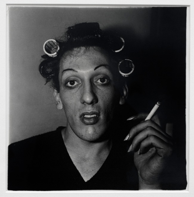 Diane Arbus (American, 1923-1971) 'A young man in curlers at home on West 20th St., N.Y.C. 1966' 1966 (installation view)