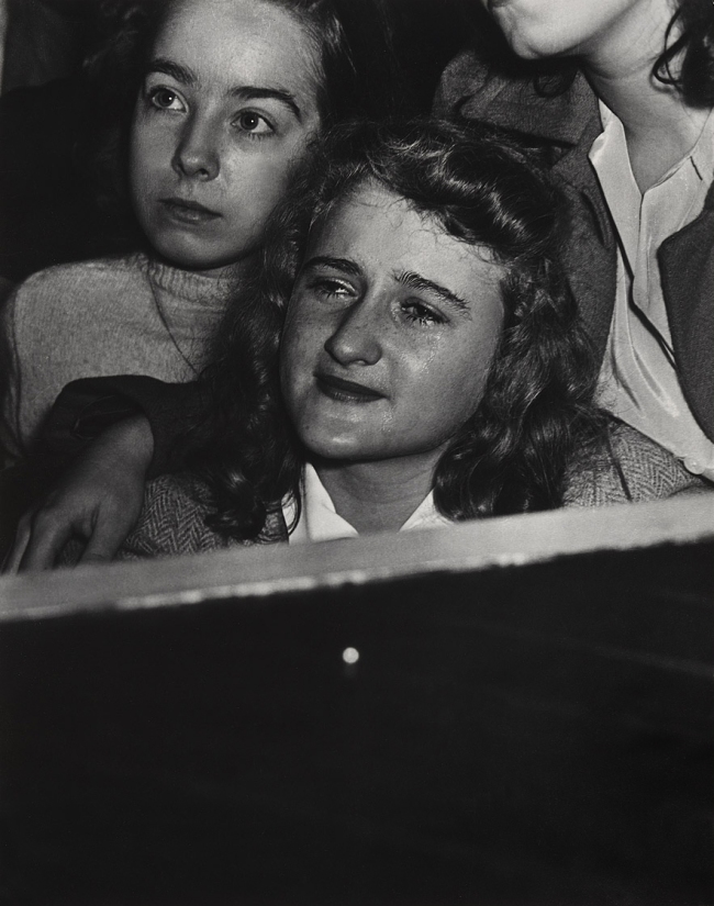 Weegee (Arthur Fellig) (1899-1968) 'No title (listening to Frank Sinatra, Palace theatre)' c. 1944