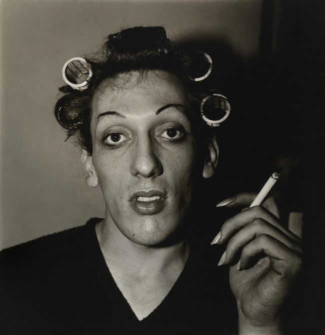 Diane Arbus (American, 1923-1971) 'A young man in curlers at home on West 20th St., N.Y.C. 1966' 1966