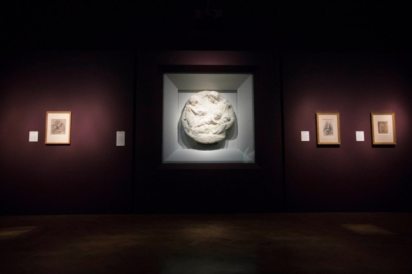 Installation view of the exhibition 'Bill Viola/Michelangelo: Life, Death, Rebirth' at the Royal Academy of Arts, London showing at centre Michelangelo Buonarroti, 'The Virgin and Child with the Infant St John', c. 1504-1505