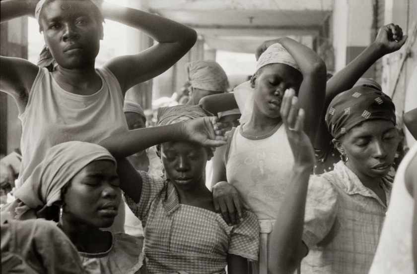 Danny Lyon (American, b. 1942) 'Haitian women praying in the market, HAITI, March 1986' 1986