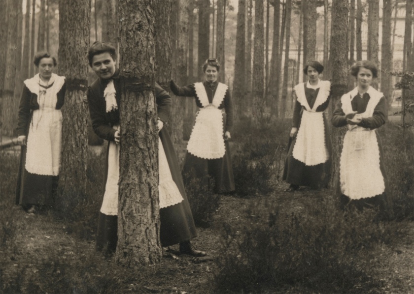 Photographer Unidentified. 'Untitled (women in aprons pose among trees)' 1913 (detail)