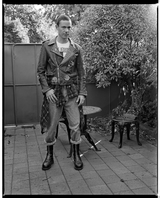 Marcus Bunyan (Australian, b. 1958) 'Self-portrait with punk jacket, flanny and 14 hole steel toe capped Docs' 1991