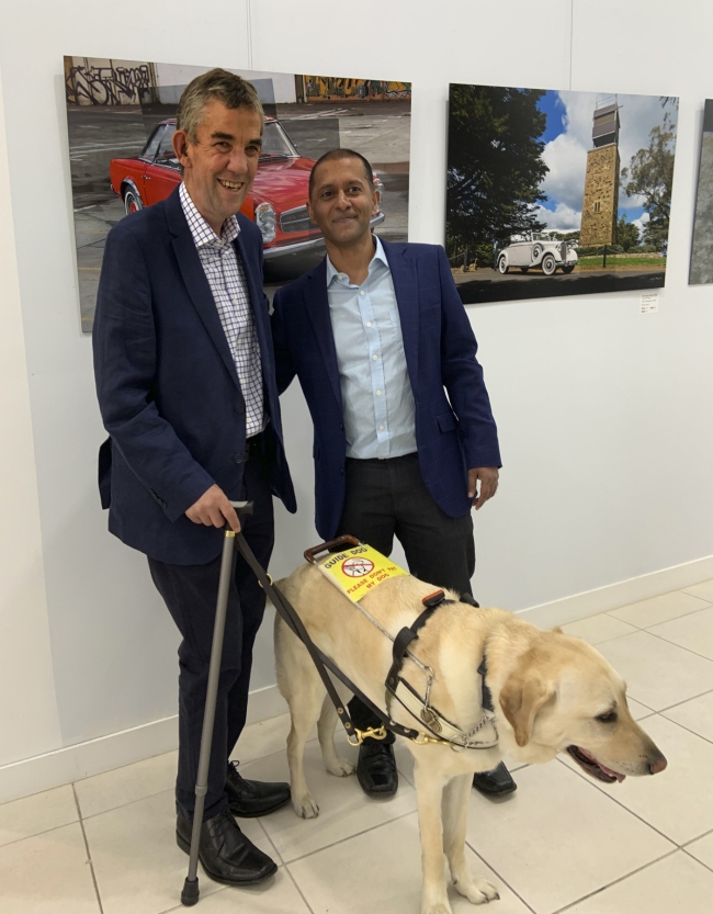 Andrew Follows with his guide dog Leo and his mentor Dishan Marikar
