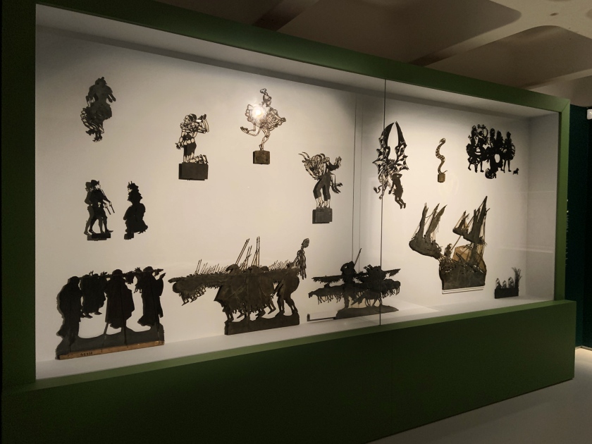 Installation view of the exhibition Into the Night: Cabarets and Clubs in Modern Art at the Barbican Art Gallery, London showing Henri Rivière and Henry Somm's shadow theatre