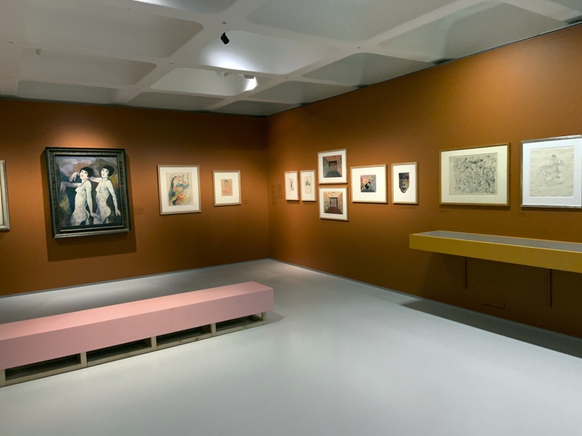 Installation view of the exhibition 'Into the Night: Cabarets and Clubs in Modern Art' at the Barbican Art Gallery, London showing at left, Karl Hofer's 'Tiller Girls' (before 1927); and at third from left, Erna Schmidt-Caroll's 'Chansonette' (Singer) (c. 1928)