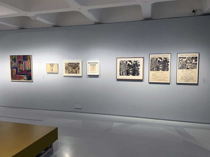 Installation view of the exhibition 'Into the Night: Cabarets and Clubs in Modern Art' at the Barbican Art Gallery, London showing at left, Muraina Oyelami's 'Burial Ground (1967) with Georgina Beier's 'Gelede' (1966) third from right