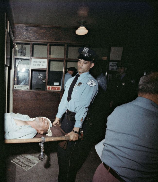 Gordon Parks (American, 1912-2006) 'Police Bring in Victim, Chicago, Illinois' 1957