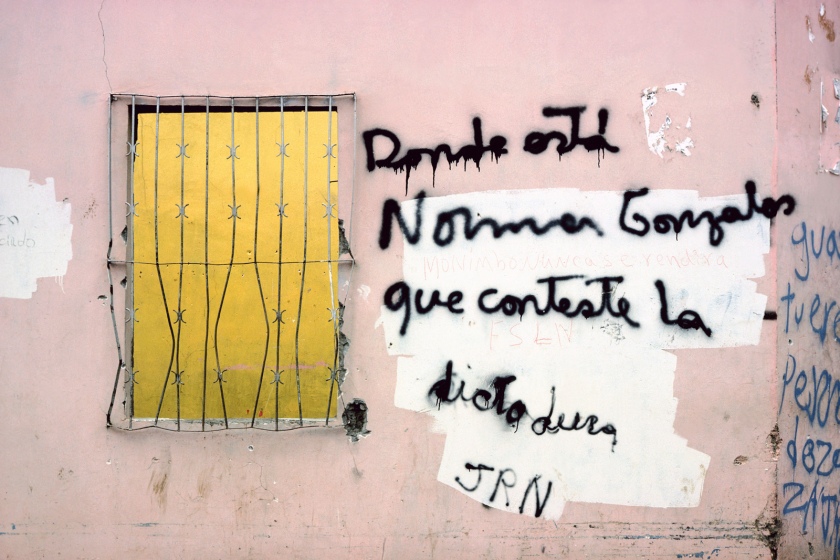 Susan Meiselas (American, b. 1948) 'Wall graffiti on Somoza supporter's burned house in Monimbó, asking "Where is Norman Gonzales? The dictatorship must answer", Nicaragua' 1978