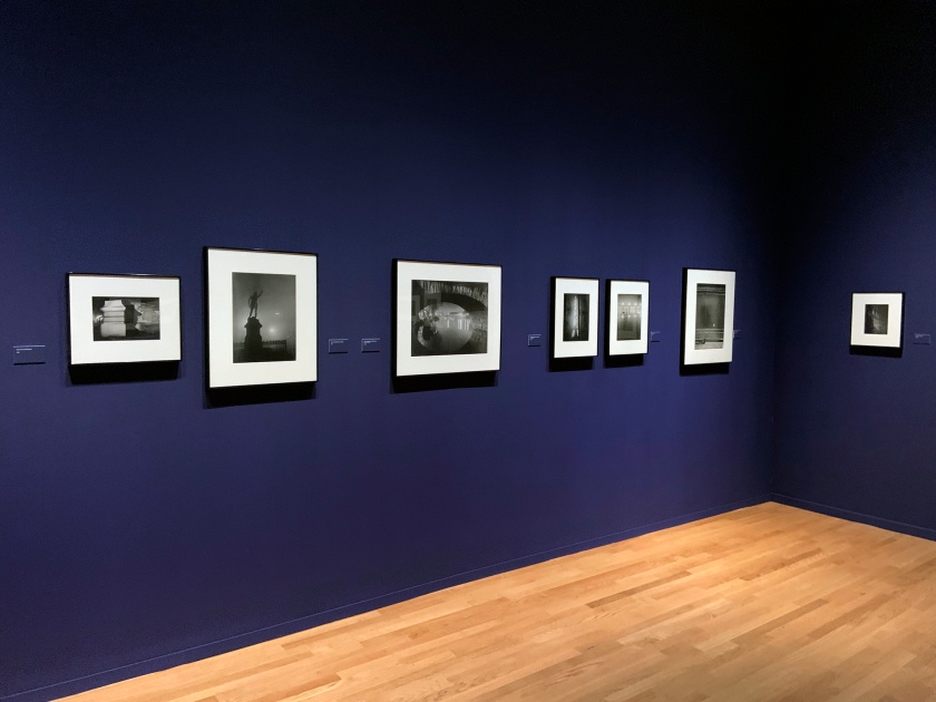 Installation view of the exhibition 'Brassaï' at Foam, Amsterdam showing at left, Brassaï's 'The Tour Saint-Jacques' 1932-1933, and at third right 'View through the pont Royal toward the pont Solférino' c. 1933