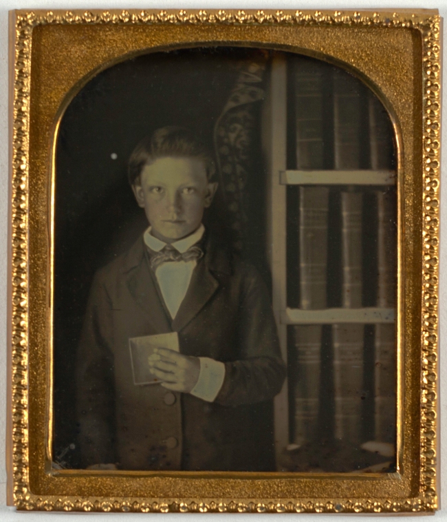 Unknown artist (American) '[Boy Holding a Daguerreotype]' 1850s