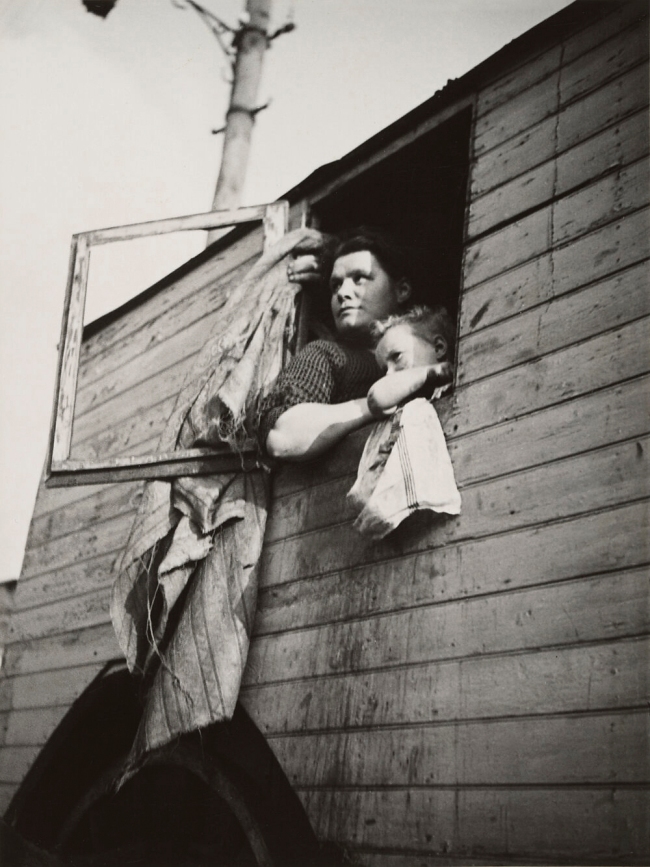 Dora Maar (French, 1907-1997) '[Woman and Child in Window, Barcelona]' 1932-1934