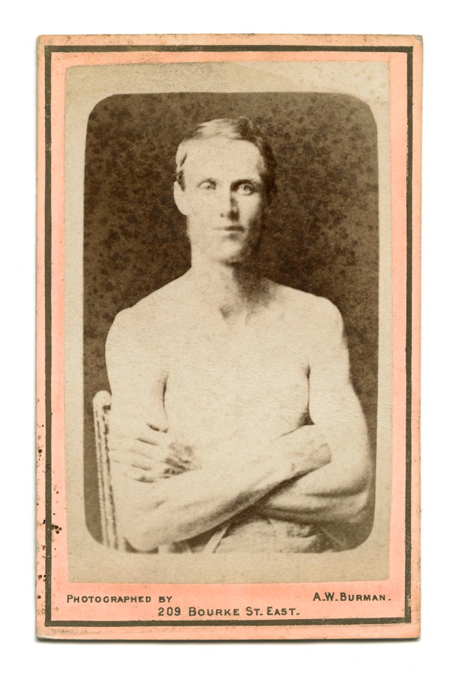 A. W. Burman (Australian, 1851-1915) (active 1869-1889, photographer) 'Untitled (shirtless man with arms folded)' 1878-1888 (recto)