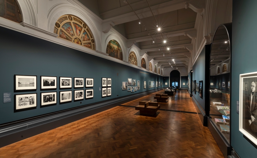 Installation view of 'Known and Strange: Photographs from the Collection' display at V&A showing at left, the work of Susan Meiselas from the 'Carnival Strippers' series