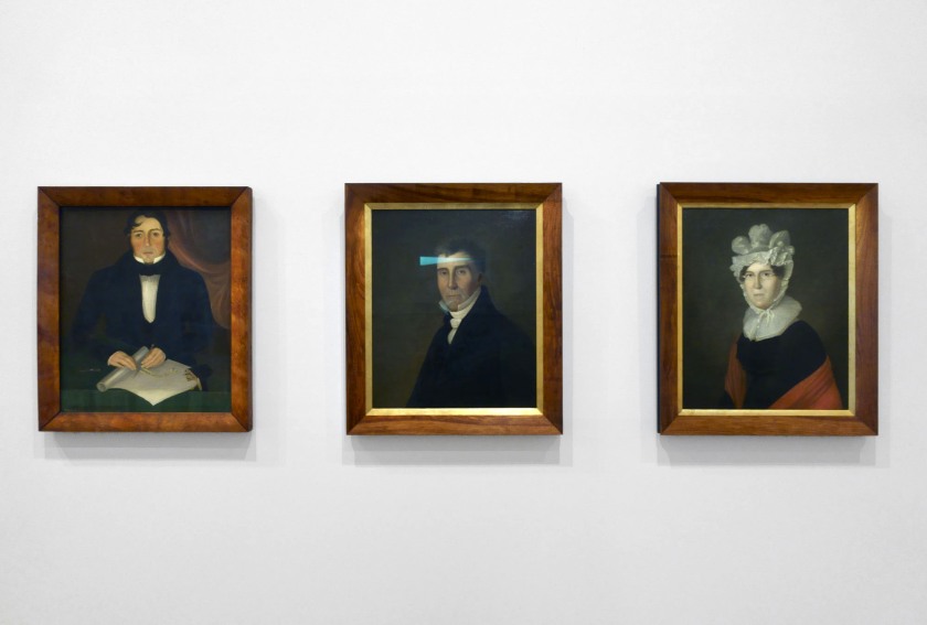 Installation view of the exhibition 'WHO ARE YOU: Australian Portraiture' at NGV Australia, Federation Square, Melbourne showing at left, William Buelow Gould's 'John Eason' (1838); at centre, Augustus Earle's 'Captain Richard Brooks' (1826-1827); and at right, Augustus Earle's 'Mrs Richard Brooks' (1826-1827)