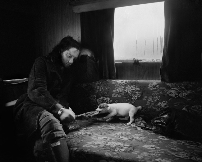 Chris Killip (British, 1946-2020) 'Alice and the little dog, Lynemouth, Northumberland' 1983