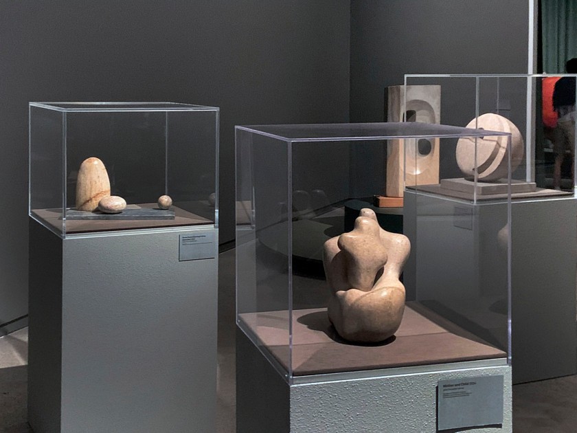 Installation view of the exhibition 'Barbara Hepworth: In Equilibrium' at the Heide Museum of Modern Art, Melbourne showing at left 'Three Forms (Carving in Grey Alabaster)' 1935; at centre 'Mother and Child' 1934; and at right 'Pierced Hemisphere II' 1937-1938
